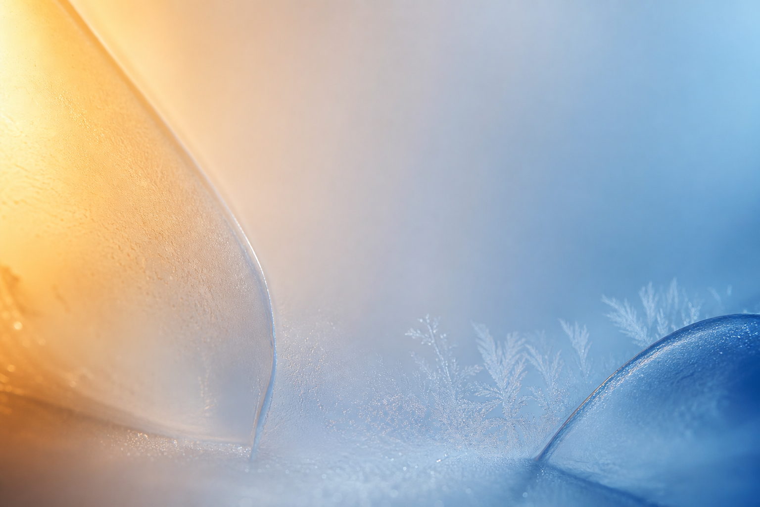 Abstract warm-to-cool temperature gradient with frost crystals, evoking controlled temperature in transit
